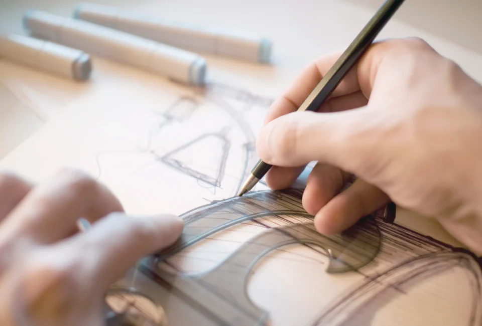 industrial designer, drawing out a concept